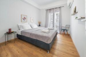 Posteľ alebo postele v izbe v ubytovaní Luxury 2 bdroom apt- Megaro Mousikis