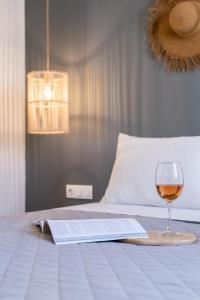 Posteľ alebo postele v izbe v ubytovaní Haka Suites Mykonos Town