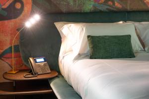 A bed or beds in a room at Atena Dolce Vita