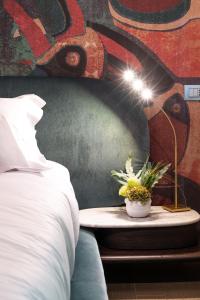 A bed or beds in a room at Atena Dolce Vita