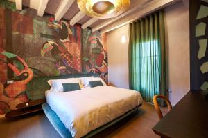 A bed or beds in a room at Atena Dolce Vita