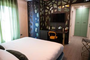 A television and/or entertainment centre at Atena Dolce Vita