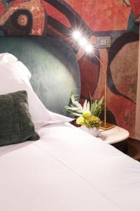 A bed or beds in a room at Atena Dolce Vita