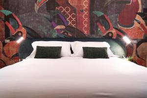 A bed or beds in a room at Atena Dolce Vita