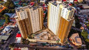 an overhead view of a city with tall buildings at Avida Aspira Condotel in Cagayan de Oro