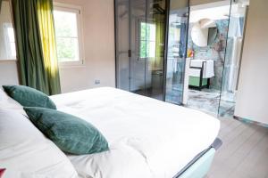 A bed or beds in a room at Atena Dolce Vita
