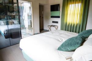 A bed or beds in a room at Atena Dolce Vita