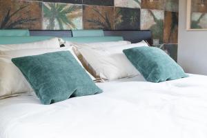 A bed or beds in a room at Atena Dolce Vita