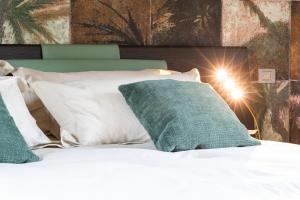 A bed or beds in a room at Atena Dolce Vita