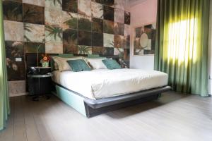 A bed or beds in a room at Atena Dolce Vita