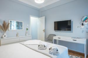TV a/nebo společenská místnost v ubytování Urban City Apartment by CloudKeys