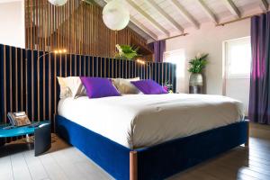 A bed or beds in a room at Atena Dolce Vita