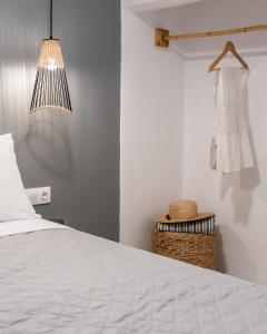 Posteľ alebo postele v izbe v ubytovaní Haka Suites Mykonos Town