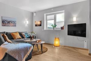 Posezení v ubytování Modern easy-living apartment in nice neighborhood