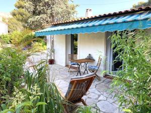 Zahrada ubytování Grand Studio 30m avec jardin proche des plages + 4 fotografie