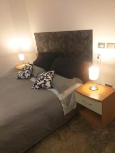 Postel nebo postele na pokoji v ubytování Executive center rooms