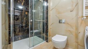 Kúpeľňa v ubytovaní Prywatne apartamenty Sun & Snow w obiekcie Ustronie Apartments