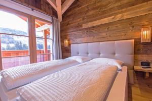 Postel nebo postele na pokoji v ubytování Appartamenti Residence Pars
