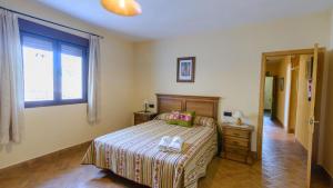 Postel nebo postele na pokoji v ubytování Casa Rural Pelijas Fontanar by Ruralidays