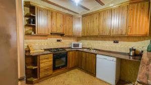 Kuchyň nebo kuchyňský kout v ubytování Casa Rural Pelijas Fontanar by Ruralidays