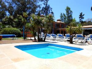 Bazén v ubytování Rincon del Este nebo v jeho okolí