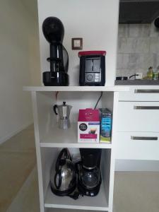 A kitchen or kitchenette at Studio Marina pointe du bout vue sur le port
