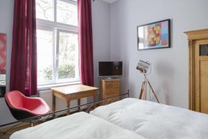 TV a/nebo společenská místnost v ubytování Hotel Residenz Begaswinkel