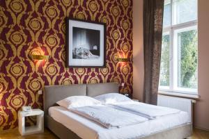 Postel nebo postele na pokoji v ubytování Hotel Residenz Begaswinkel
