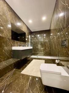 Ванна кімната в Nova Mansão LA
