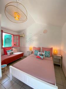 Postel nebo postele na pokoji v ubytování Hotel De la Plage