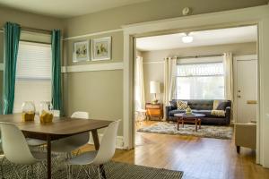 a living room with a table and chairs at Cooper Spur in Portland