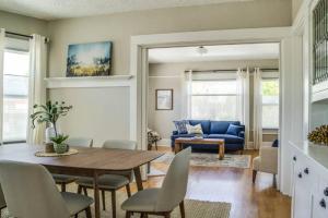 a dining room and living room with a table and chairs at Angel's Rest in Portland