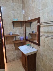 Koupelna v ubytování Karibuni palace mtwapa