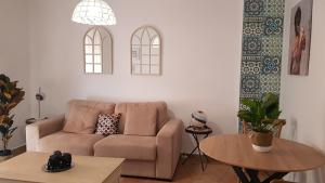 A seating area at Duquesa María Apartamento en el corazón de Granada