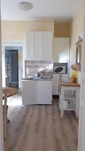Kuchyň nebo kuchyňský kout v ubytování Appartement Harrer