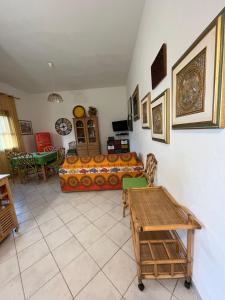 a living room with a couch and a table at La casa sotto la torre in Chia