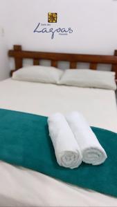 En eller flere senge i et værelse på Pousada Canto das Lagoas