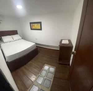 Letto o letti in una camera di Agradable casa en Buga junto a la basílica