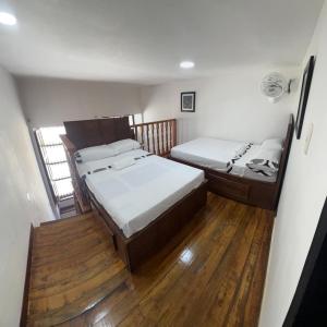 Letto o letti in una camera di Agradable casa en Buga junto a la basílica