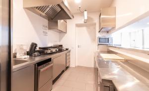 Una cocina o zona de cocina en Albergue "El Río"
