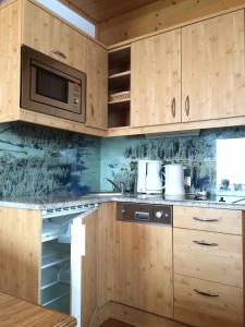 Kuchyň nebo kuchyňský kout v ubytování Appartement Aigner