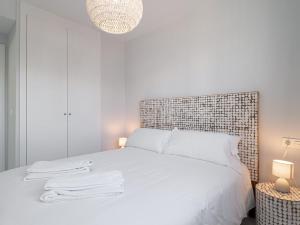 Łóżko lub łóżka w pokoju w obiekcie Via Celere 2344
