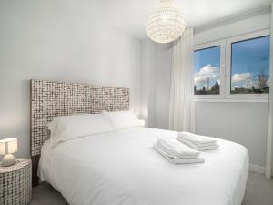 Łóżko lub łóżka w pokoju w obiekcie Via Celere 2344