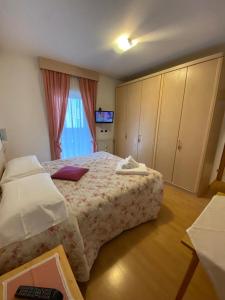 Postel nebo postele na pokoji v ubytování Cesa Bernard
