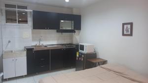 Una cocina o zona de cocina en Apartaestudio Laureles la 33