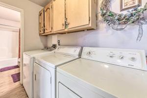 a laundry room with a washer and dryer at Dog-Friendly Alto Escape with Hot Tub and Foosball! in Alto +30 photos