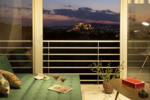 A balcony or terrace at Stunning Acropolis view apartment