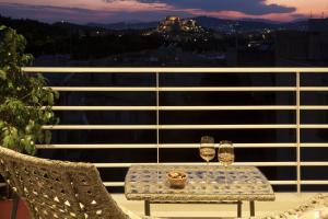 A balcony or terrace at Stunning Acropolis view apartment