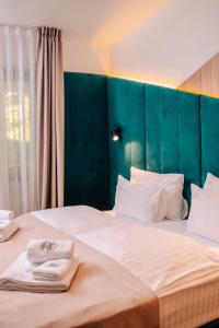 Krevet ili kreveti u jedinici u objektu Hotel Forest