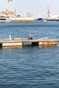 a dock in the middle of a body of water at Minty of Kip in Lisbon